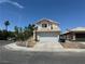 Two-story home on a corner lot with a two car garage and tile roof at 5128 Sandstone Dr, Las Vegas, NV 89142
