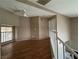 Second floor landing features a ceiling fan and a view to the outdoors at 5128 Sandstone Dr, Las Vegas, NV 89142