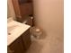 Cozy half bath with tile floors and wood vanity at 5199 Caliente St # 64, Las Vegas, NV 89119