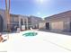 Community pool with hot tub and apartment buildings at 5199 Caliente St # 64, Las Vegas, NV 89119