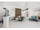 Stylish dining room featuring marble floors, a modern table, and contemporary decor at 5332 Desert Blossom Rd, Las Vegas, NV 89107