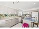 Contemporary kitchen featuring stylish cabinets, marble countertops, and modern appliances at 5332 Desert Blossom Rd, Las Vegas, NV 89107