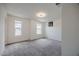 Spacious bedroom featuring neutral tones, ample natural light, and plush carpeting at 5927 Coja St, Las Vegas, NV 89113