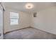 Comfortable bedroom featuring modern lighting, a window view, and closet with sliding doors at 5927 Coja St, Las Vegas, NV 89113