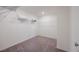 The walk-in closet features ample storage space and neutral carpeting at 5927 Coja St, Las Vegas, NV 89113