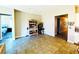 Inviting living area with neutral walls, tile floors, and an adjacent dining room at 6021 Vivanco St, North Las Vegas, NV 89081