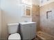 Updated bathroom features tiled shower, modern vanity, and recessed lighting for a clean, fresh feel at 6112 Fairwood Cir, Las Vegas, NV 89107