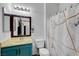 Modern bathroom with vanity and a stylish, marble-patterned shower curtain at 6170 E Sahara Ave # 1061, Las Vegas, NV 89142