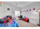 Bedroom features a comfy bed, window, and lots of fun decorations at 6170 E Sahara Ave # 1061, Las Vegas, NV 89142