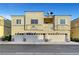 Multi-Gathering unit displaying a Spanish style, a stucco exterior, and private garage parking at 6170 E Sahara Ave # 1061, Las Vegas, NV 89142