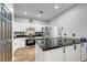 Stylish kitchen boasting granite countertops, stainless steel appliances, and white cabinets at 6170 E Sahara Ave # 1061, Las Vegas, NV 89142