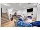 Bright living room featuring a modern fireplace, hardwood floors, and comfortable seating at 6170 E Sahara Ave # 1061, Las Vegas, NV 89142