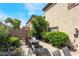 Private backyard featuring patio area and relaxing lounge chairs and lush greenery at 632 Monument Point St, Henderson, NV 89002