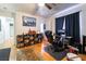 Bedroom featuring a ceiling fan, hardwood floors, a desk and plenty of storage at 632 Monument Point St, Henderson, NV 89002