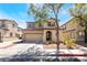 Charming two-story home with a two-car garage and well-manicured landscaping at 632 Monument Point St, Henderson, NV 89002