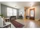 Inviting foyer with tile floors, elegant furnishings, and lots of natural light at 632 Monument Point St, Henderson, NV 89002