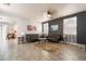 Spacious living room with tile floors, recessed lighting, and two comfortable sofas at 632 Monument Point St, Henderson, NV 89002