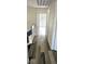 The hallway features modern flooring, with neutral wall color, and leads to the rest of the home at 708 Fernwood Ln, Las Vegas, NV 89169