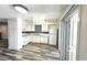 Well-lit kitchen featuring white appliances, ample counter space, and a decorative backsplash at 708 Fernwood Ln, Las Vegas, NV 89169