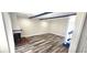 Bright living room with laminate floors, fireplace and blue accents at 708 Fernwood Ln, Las Vegas, NV 89169