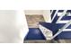 Blue and white painted staircase with laminate floors at 708 Fernwood Ln, Las Vegas, NV 89169