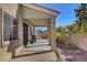 Covered patio featuring a grill and access to the backyard at 7331 Abundant Harvest Ave, Las Vegas, NV 89131