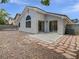 Backyard featuring minimal landscaping and a concrete patio at 7524 Fencerow St, Las Vegas, NV 89131