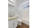 Well-lit bathroom featuring modern fixtures and tile flooring at 7524 Fencerow St, Las Vegas, NV 89131