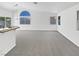 Bright and spacious living room with vaulted ceilings, new carpet, and natural light at 7524 Fencerow St, Las Vegas, NV 89131