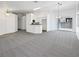 Bright living room featuring an open floor plan and sliding glass door at 7524 Fencerow St, Las Vegas, NV 89131
