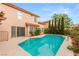 Backyard with a swimming pool, and landscaped patio area at 7544 Shangri La Ave, Las Vegas, NV 89147
