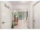 Bright hallway leads to a serene pool area, offering a glimpse of outdoor relaxation and entertainment at 7544 Shangri La Ave, Las Vegas, NV 89147