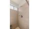 Enclosed tiled shower with shower head and fixtures at 7544 Shangri La Ave, Las Vegas, NV 89147