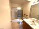 Bathroom featuring a shower-tub combo, and a vanity with ample counter space at 7570 W Flamingo Rd # 202, Las Vegas, NV 89147