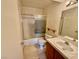 Bathroom featuring a shower-tub combo, and a vanity with ample counter space at 7570 W Flamingo Rd # 202, Las Vegas, NV 89147