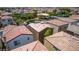 An aerial view of a suburban neighborhood with a playground visible in the foreground at 7694 Hampton Park Ln, Las Vegas, NV 89113