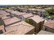 An aerial shot showcasing the property nestled in a densely populated suburban community at 7694 Hampton Park Ln, Las Vegas, NV 89113