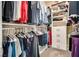 Walk-in closet offering ample hanging space, shelving, and built-in drawers at 7694 Hampton Park Ln, Las Vegas, NV 89113