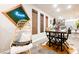 Charming dining area with a table, chairs, and stylish decor, adjacent to kitchen area at 8113 Misty Canyon Ave, Las Vegas, NV 89113
