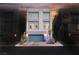Modern home's front exterior boasts a three-story facade and blue accents at 8113 Misty Canyon Ave, Las Vegas, NV 89113