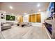 Bright and spacious living room featuring comfortable seating and modern decor at 8113 Misty Canyon Ave, Las Vegas, NV 89113