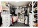Well-organized walk-in closet with custom shelving, hanging racks, and ample storage space at 8113 Misty Canyon Ave, Las Vegas, NV 89113