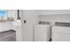 Bright laundry room with view of the kitchen at 8389 Charlton Valley Ct, Las Vegas, NV 89123