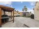 Backyard featuring a pergola, storage shed, and ample patio space at 8780 Autumn Wreath Ave, Las Vegas, NV 89129