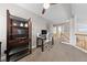 Bonus room features neutral walls, carpeting, and a ceiling fan at 8780 Autumn Wreath Ave, Las Vegas, NV 89129