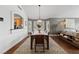 Elegant dining area with hardwood floors and stylish furnishings at 8780 Autumn Wreath Ave, Las Vegas, NV 89129