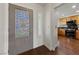 Welcoming foyer adjacent to a modern kitchen with stainless steel appliances at 8780 Autumn Wreath Ave, Las Vegas, NV 89129