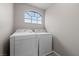 Laundry room showcasing washer and dryer hookups at 8780 Autumn Wreath Ave, Las Vegas, NV 89129