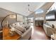 Cozy living room featuring vaulted ceilings and ample natural light at 8780 Autumn Wreath Ave, Las Vegas, NV 89129