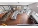 Open-concept living room boasts hardwood floors and large windows at 8780 Autumn Wreath Ave, Las Vegas, NV 89129